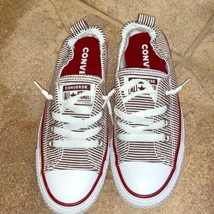 only worn once. more of a burgundy color